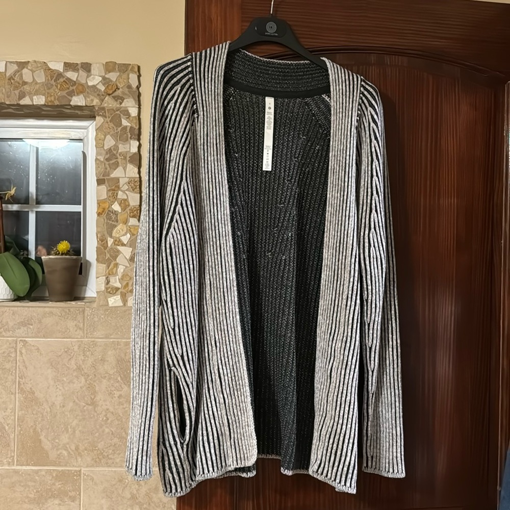 Beautiful, soft, thick, black and white Lululemon sweater. Only worn once!